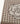 FULAR DE PATA DE GALLO Y FLORES JACQUARD COLOR TAUPE